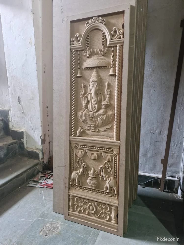 CNC carved temple door panel with figurative relief and a moulded border, raw board