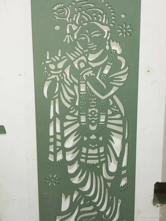 Full height CNC cut jaali panel with a figure cut right through the board, primed